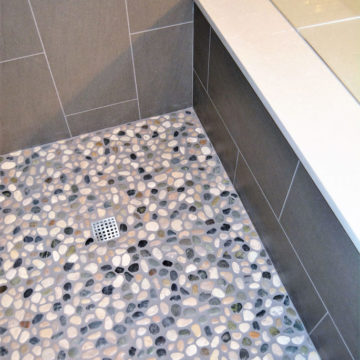 New pebble flooring tile surround shower