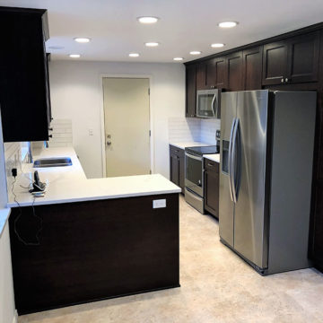 Completed Kitchen new cabinets quartz countertops backsplash appliances