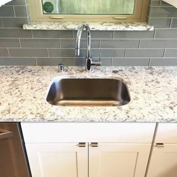 New kitchen sink quartz countertop and matching quartz windowsill