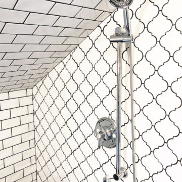 New shower hardware with tile surround