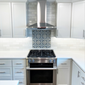 New Miele stove with accent tile background